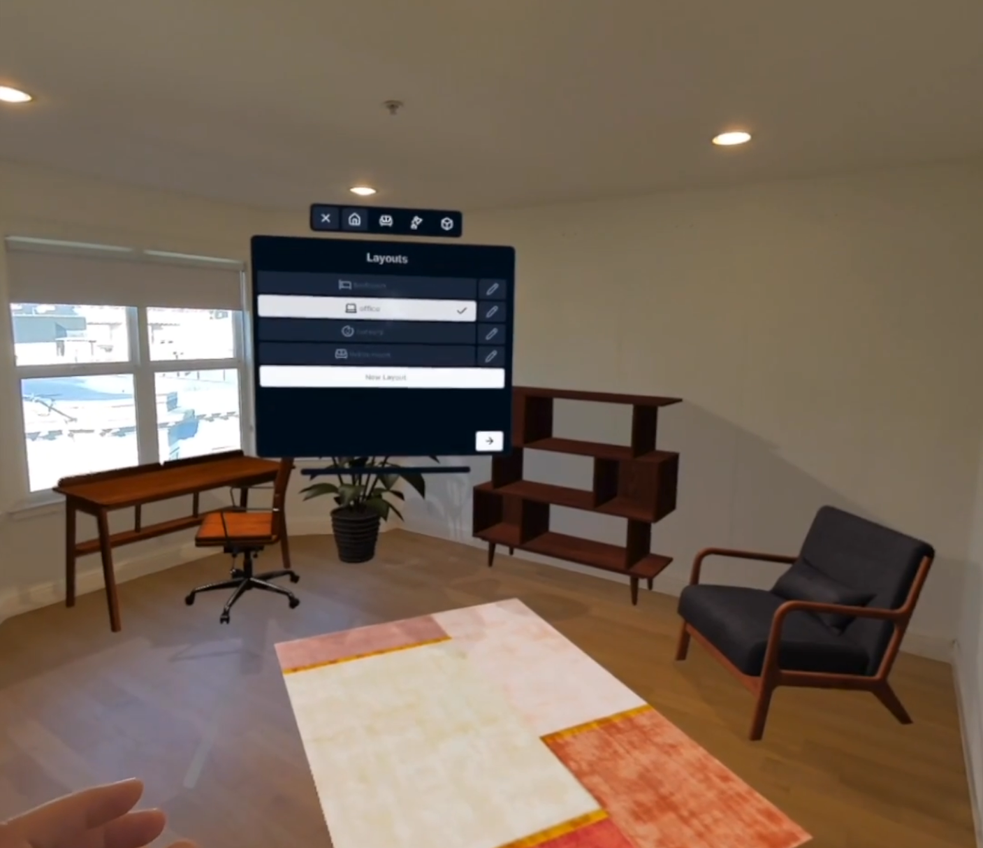 A capture from within an AR headset of a realspace room with virtual furniture models laid out within, and a floating menu